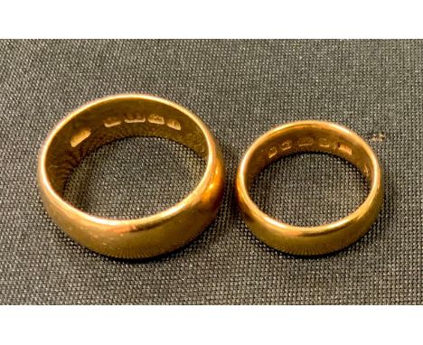 A 22ct gold half barrel wedding band, size T, Birmingham, 1916; another size K, Birmingham, 1921 total 20.5g 