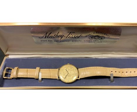 A Mathey-Tissot 14K Gold Liberty coin watch, white manual movement, 