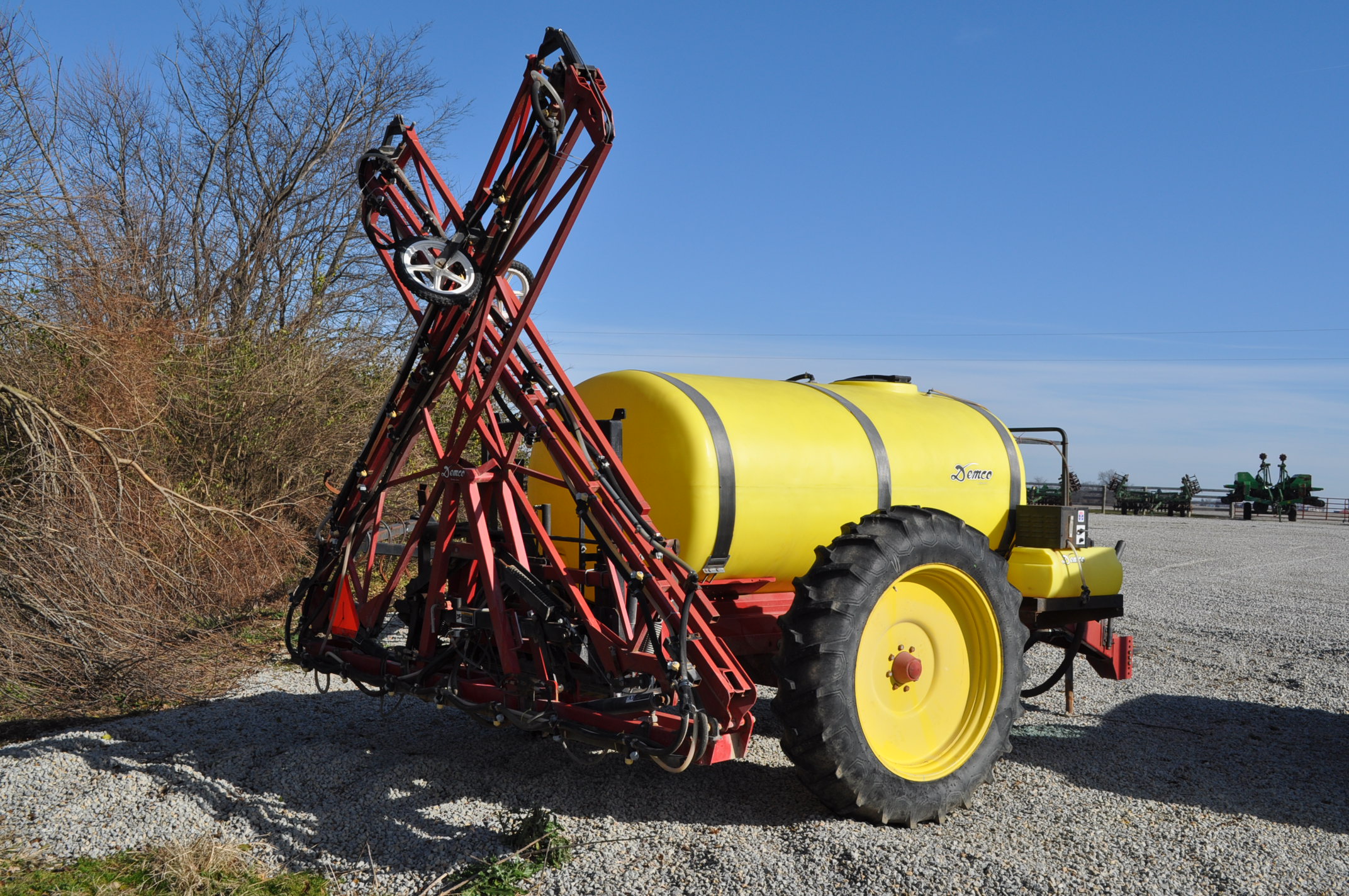 Demco pull type sprayer, 1000 gal poly tank, 60' hyd fold booms, PTO