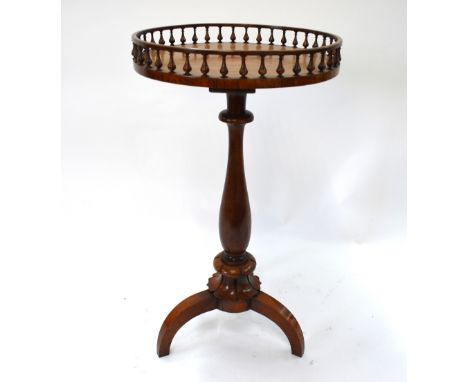 A William IV rosewood pedestal tripod table with circular spiral gallery top, 40 x 75 cm