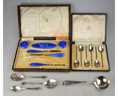 A cased set of six silver seal-top coffee spoons, Mappin & Webb, Sheffield 1924, to/w an early George III OEP sauce ladle, Ro