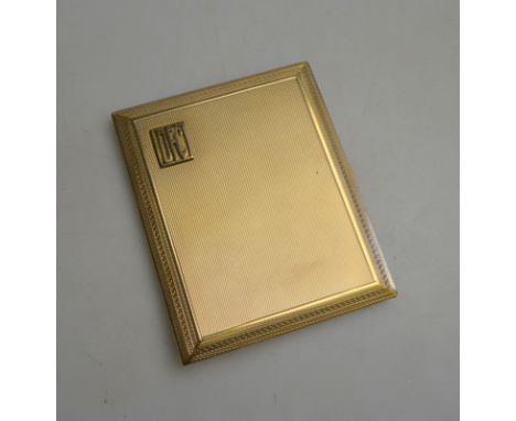A 9ct yellow gold engine turned cigarette case having applied initials DFC, approx 127g