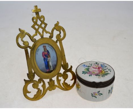 A Continental faience patch-box with brass rim and hinge, painted with floral sprays, VP monogram, 5-8 cm diam to/w a French 