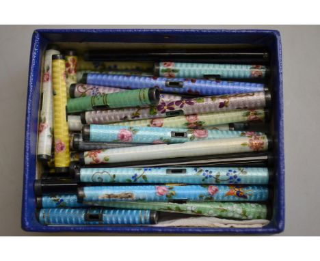 A quantity of Chinese cylindrical polychrome enamel beads/buttons