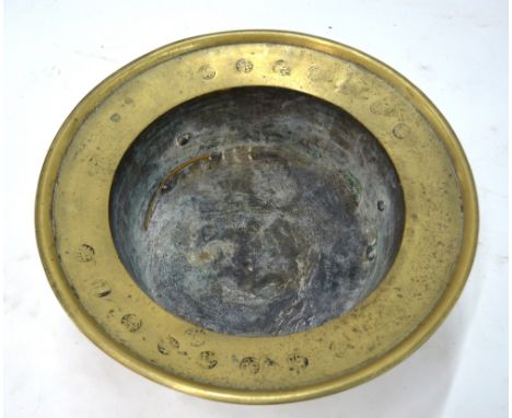 A brass or metal alloy tripod incense burner of circular form, possibly Korean; the rim stamped with Chinese characters, 39 c
