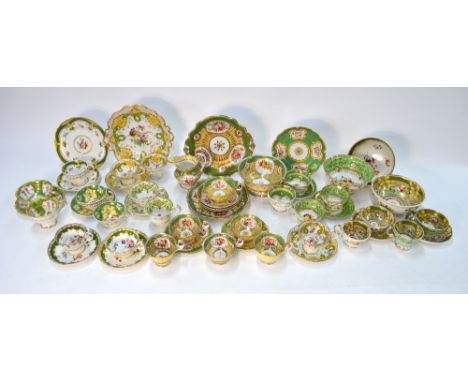 A collection of Ridgway 1830-1850's teawares, all handpainted with polychrome flowers/fruit on a gilded green ground and incl