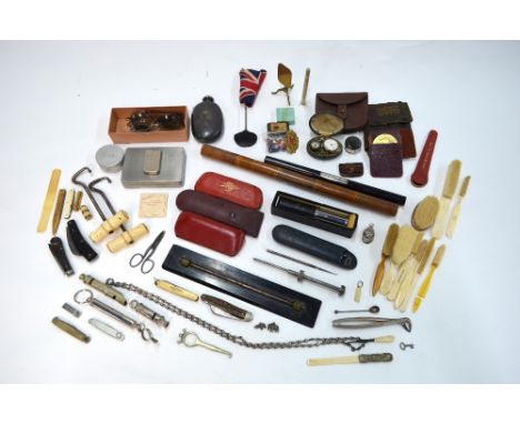 A quantity of vintage collectables including a pair of bone-handled boot-pulls, bone toothbrushes, penknives, spring balances