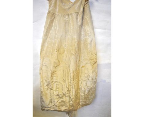 A Victorian fine grain cream floral embroidered silk cloak with fixed shoulder cape, a cram fine lawn half-slip with embroide