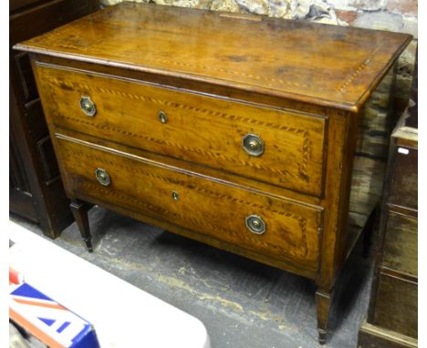 An 18th/19th century Italian fruitwood commode, the chequer banded top over two long drawers (later converted to fall fronts)