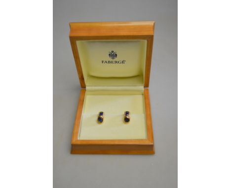 Modern Fabergé - A pair of sapphire and diamond earrings for pierced ears, decorated with blue enamel to/w certificate and or