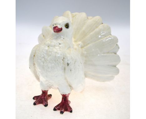 A ceramic figure of a fantail pigeon, un-marked, 20 cm wide, 19th/20th Century Condition Report No easily identifiable areas 
