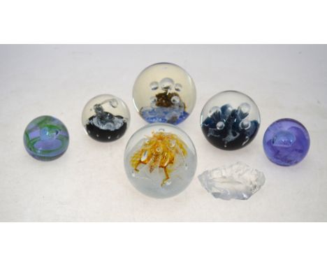 A Selkirk glass paperweight of spherical form, Limited Edition No. 38/500, dated 1989; and a glass weight or sculpture, desig