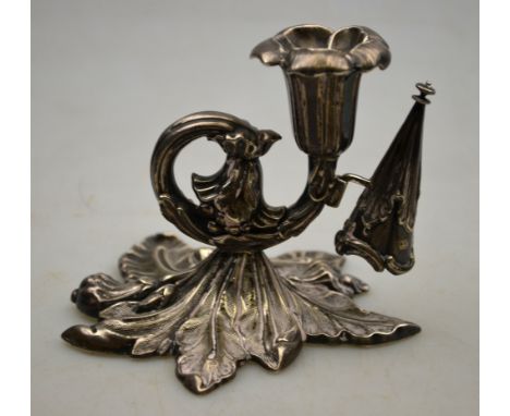 A Victorian silver taperstick of floral and leaf design, with conical snuffer, Henry Wilkinson & Co., Sheffield 1842, 9 cm hi