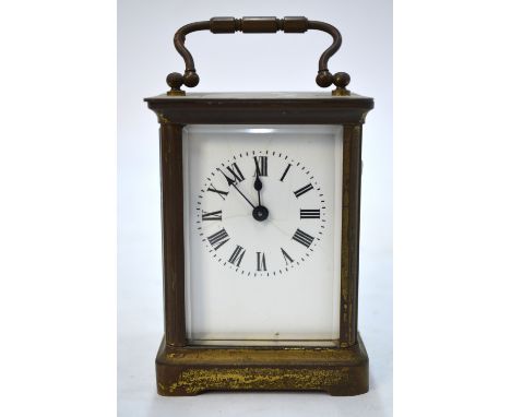 A lacquered brass carriage clock, the eight-day movement signed ACC, 11 cm high