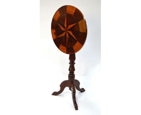 A Victorian specimen inlaid tripod table, the circular tilt top with star design raised on a baluster turned support to shape