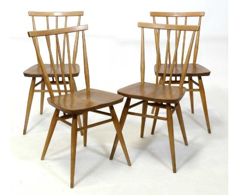 A set of four 1960s Ercol Model 391 blond elm and beech stickback kitchen chairs, raised on turned slightly tapering supports