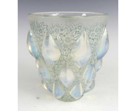René Lalique (1860-1945) - a moulded and opalescent glass 'Rampillion' vase, the lozenge shaped protruding graduated moulding
