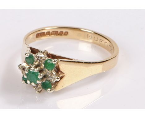 9 Carat gold emerald set ring, in the form of a flower head, ring size P