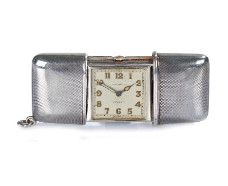 Movado purse watch, the signed silver dial with Arabic numerals, the silver case with engine turned decoration, A/F