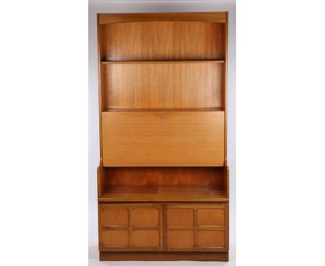 Nathan teak bookcase, with curved pediment above a single shelf and fall panel opening to reveal a pigeonholed interior with 