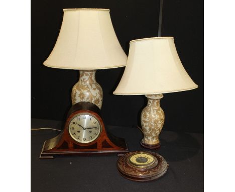 Edwardian Napoleon hat mantel clock, barometer in a carved mahogany frame, two porcelain reading lamps with foliate decoratio