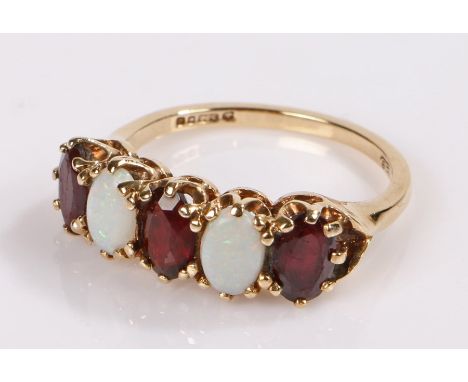 9 carat gold opal and garnet set ring, ring size L