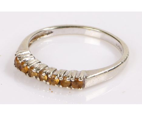 9 carat white gold ring, set with yellow stones to the head, ring size N
