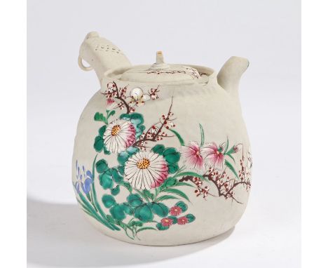 Japanese teapot, the body with polychrome foliate decoration, the side handle with ring finial, embossed stamps to body