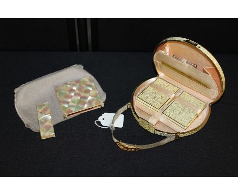 Ladies evening bag, the exterior decorated with animals in a landscape, the interior with gilt sliding pencil, comb, cigarett