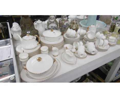 A SUBSTANTIAL WHITE AND GOLD TEA DINNER SERVICE