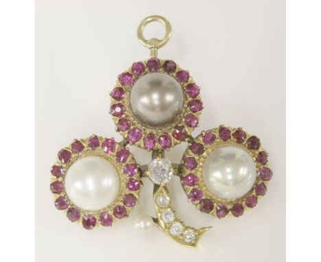 A Victorian pearl, diamond and ruby trefoil cluster brooch/pendant, c.1890,of shamrock form.  Three pearl and ruby cluster he