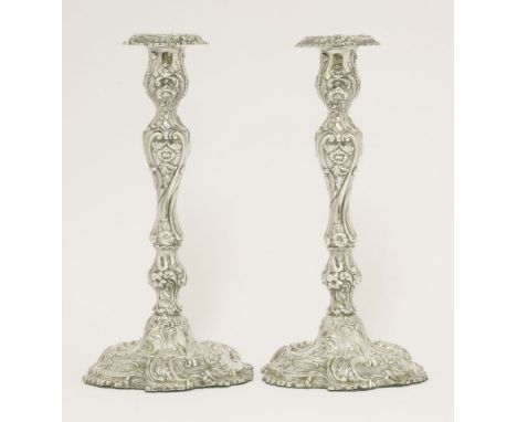 A pair of Victorian silver candlesticks,by Henry Wilkinson & Co., Sheffield 1851,in the 18th century rococo style, 26.5cm hig