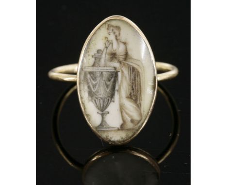 A late Georgian gold memorial ring,painted on ivory with a young Grecian lady leaning on an urn, inscription verso 'HL, 6th J