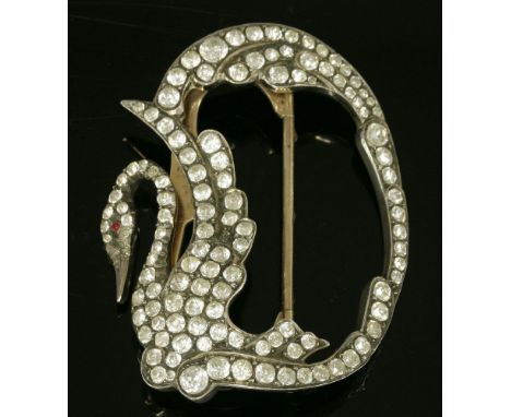 A French paste set silver buckle,in the form of a swan with maker's mark for Auguste Besson.  Scrolling buckle with a swan an