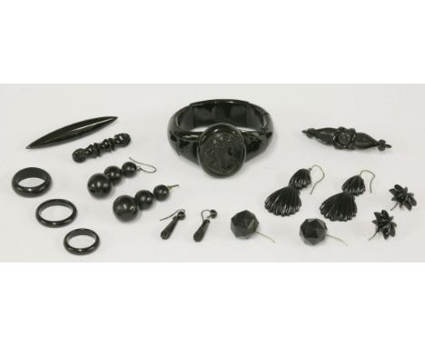 A pair of Victorian carved clamshell drop earrings,  HBwith two articulated, graduated clamshells,together with an elasticate