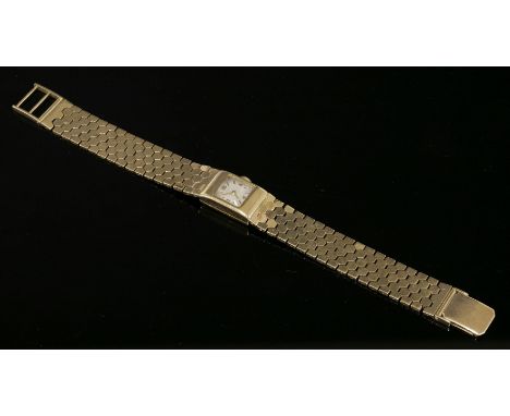 A ladies' 9ct gold Girard-Perregaux mechanical bracelet watch, c.1950,with a rectangular case.  A square silvered dial with g