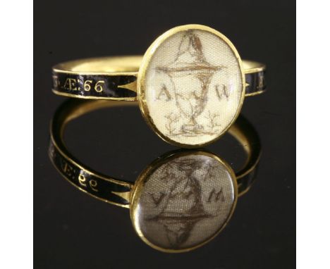 A George III memorial ring,  HBwith a cut or stitched hair urn and initials 'AW' beneath an oval glazed cover.  A flat sectio