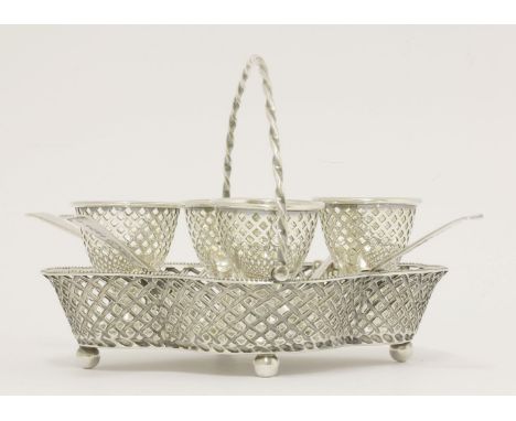 A Victorian silver swing-handled egg cruet, by Henry Wilkinson & Co., Sheffield 1858, of trellis pierced quatrefoil form on f