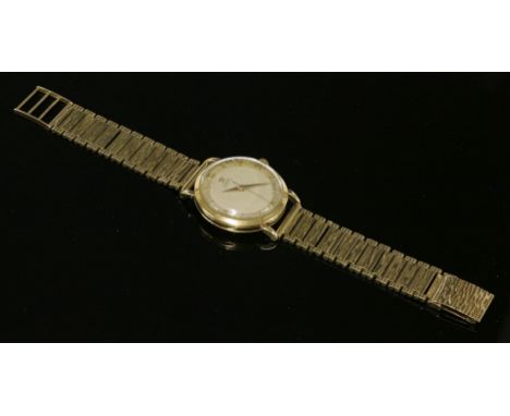 A gentlemen's 9ct gold Omega Automatic strap watch, c.1959,with a later 9ct gold bracelet.  Circular case, bevelled bezel, si