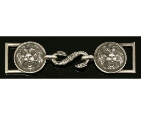 A Georgian sterling silver belt buckle, c.1809,probably military, with a pair of circular cast lion mask roundels, with an 'S