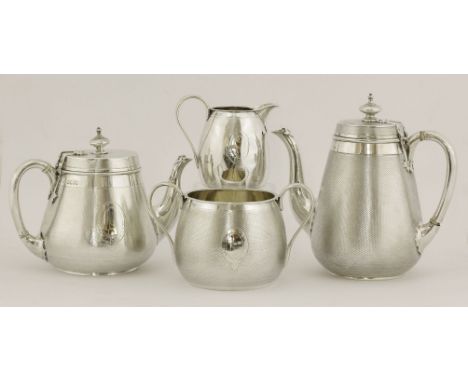 A Victorian silver matched four-piece tea and coffee set,comprising:the coffee pot,by John Samuel Hunt, London 1865,the teapo