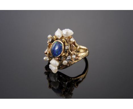 An 18ct three-colour gold black opal triplet diamond and freshwater pearl ring, c.1970,by Christopher Nicholas Hamilton.  An 