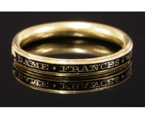 A George II flat section memorial ring,  HBwith court-shaped interior.  Black champlevé enamel ground with gold memorial to r