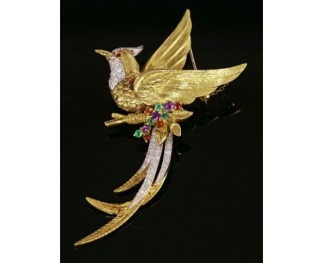 A gold, diamond, ruby, amethyst, citrine and emerald bird of paradise brooch, c.1950,the bird perched on a branch with wings 