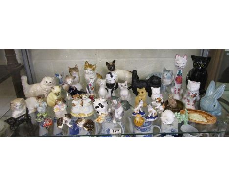 Shelf of cats to include Lladro, SylvaC, Beswick &amp; Royal Worcester