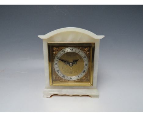ELLIOTT FOR GARRARD &amp; CO., a small white onyx mantel clock, square dial with silvered chapter ring with black Roman numer