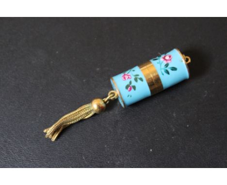 AN ENAMEL AND GILT METAL PURSE / CHATALAINE WATCH, with slide opening design, closed W 6.5 cm inc tassel Condition Report:wor