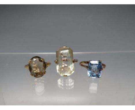 A COLLECTION OF THREE LADIES GEMSET DRESS RINGS, to include two 9ct gold examples, both ring size P - approximate combined we