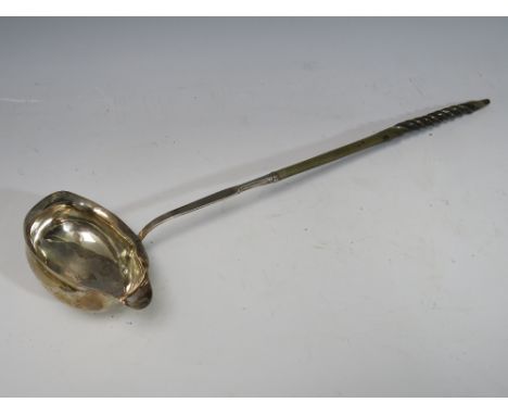 A GEORGIAN HALLMARKED SILVER LADLE WITH EBONISED HANDLE