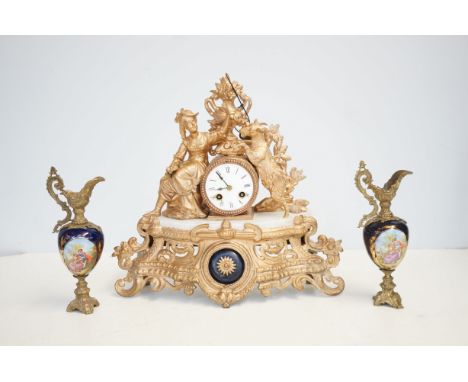 Gilt metal metal clock &amp; garniture with key 